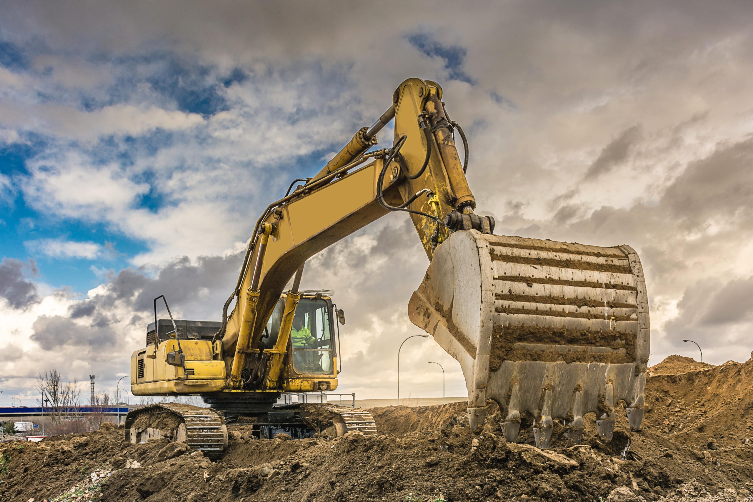 Digger at work in mud
